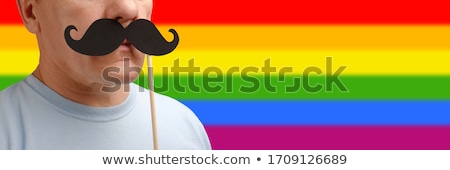 Stock foto: Close Up Of Couple With Gay Pride Rainbow Ribbons