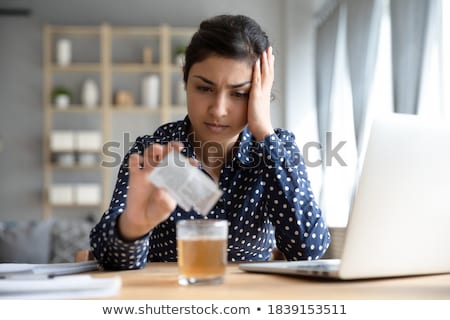 Stock photo: Young Employee Suffering From Excessive Work