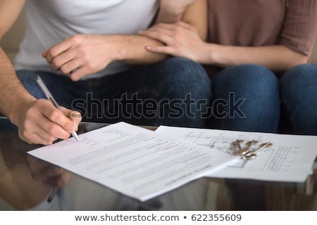 ストックフォト: Person Filling Rental Contract Form