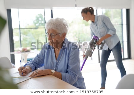 Stock foto: Disabled Cleaner Doing Chores At Home