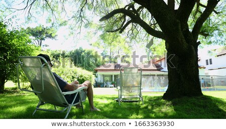 [[stock_photo]]: Senior Man Relaxing In Garden At Home