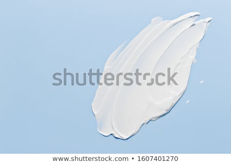 Foto stock: Smearing Sunscreen