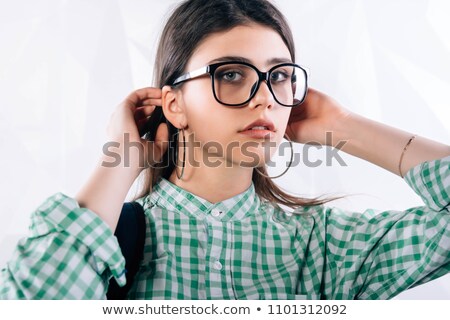 [[stock_photo]]: Young Woman Wearing Black Framed Glasses