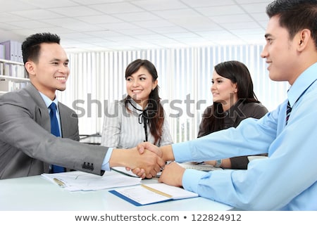 Stock photo: Hands Unite With Eachother As Friends Greeting