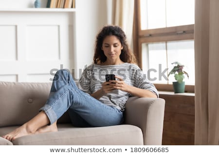 ストックフォト: Woman Writing Sms
