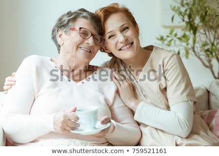 Stockfoto: Doctor And Patient Drinking Tea