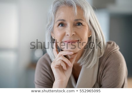 Foto stock: Senior Woman Portrait At Home With White Hair