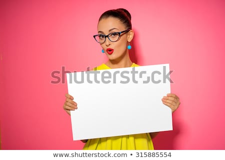 Foto stock: Beautiful Young Woman Holding Empty White Board