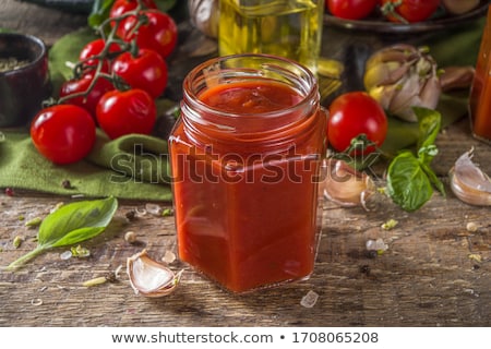 Stok fotoğraf: Small Jars Of Tomato Sauce