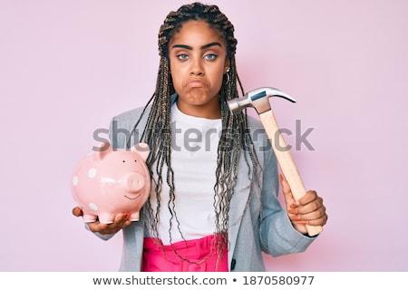 Stock photo: Worried And Afraid Piggy Coin Bank