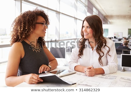 Zdjęcia stock: Happy Colleagues In Office Talking With Each Other