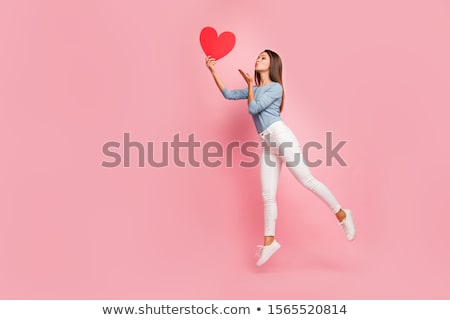 Foto stock: Woman Sending Kiss Hearts