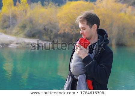 Сток-фото: Father Carrying Baby In Park