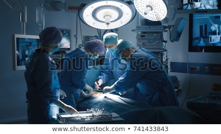 Stock fotó: Surgeon Operating Patient In Operation Theater