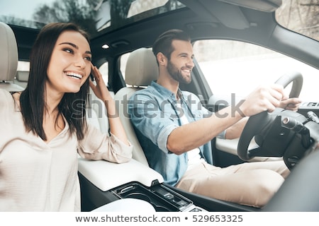 Foto d'archivio: Happy Couple In The Car