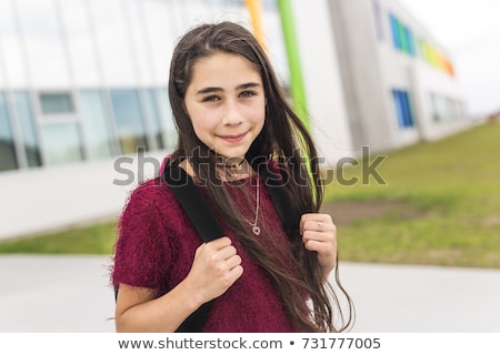 Stock fotó: Nine Years Old Girl Student At School