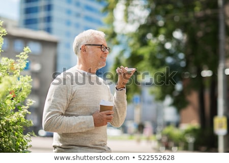 Foto stock: Man Using Voice Command Or Calling On Smartphone