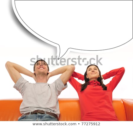 Stock fotó: Closeup Portrait Of Adult Couple Sitting On Their Sofa At Their