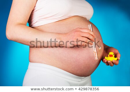 Сток-фото: Pregnant Belly With Blue Rubber Duck