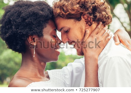 Stock photo: Interracial Couple In A Park