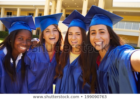 ストックフォト: Portrait Of A Smiling Teenage Girl Celebrating Graduation