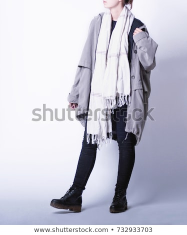 Сток-фото: Fashionable Woman Wearing Parka Coat And Scarf In Studio In Fron