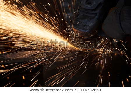 Stock foto: Worker Cutting Iron With Professional Tool
