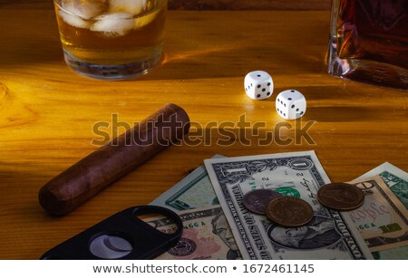 Foto stock: Us Dollar Banknotes And Cuban Cigar