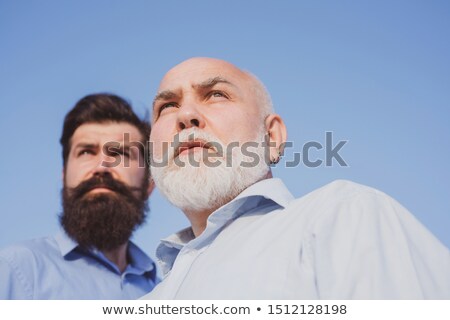 Stock photo: Men Of Age Generations Growing Up With Sky