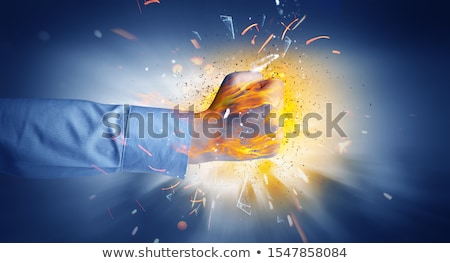 [[stock_photo]]: Hand Hits Intense And Makes Fire