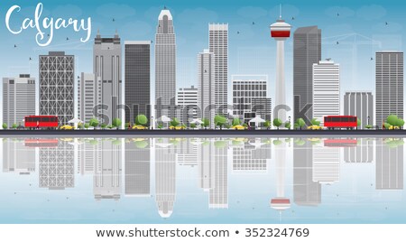 Stock photo: Calgary Skyline With Gray Buildings Blue Sky And Copy Space