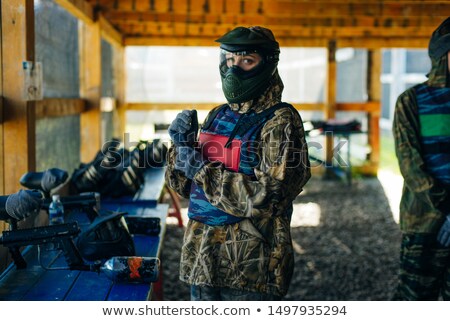 Foto stock: Female Paintball Player