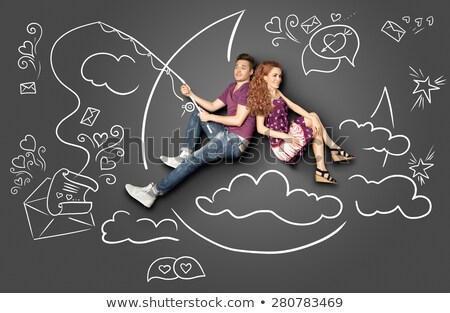 Foto d'archivio: Happy Valentines Love Story Concept Of A Romantic Couple Fishing On A Moon With A Paper Letter On A