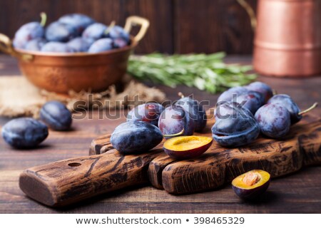 Stock photo: Fresh Organic Plums In Copper Bowl And On Rustic Wooden Cutting Board