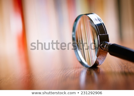 Foto stock: Magnifying Glass On Wooden Table