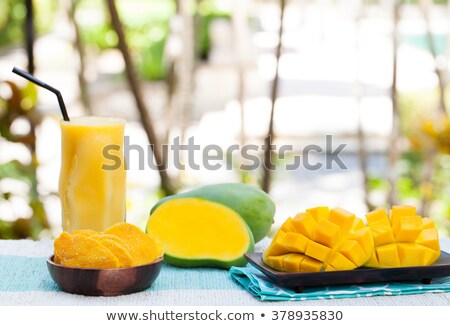 Foto stock: Fresh And Dried Mango Fruit With Smoothie Juice