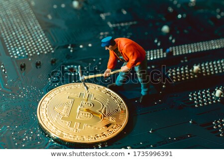 Stock fotó: A Worker Mining Cyber Coin