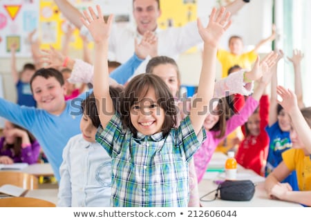 Stock foto: Chulkinder · und · ihr · Lehrer · in · einer · Grundschulklasse