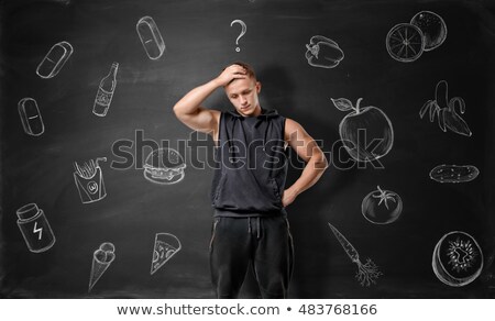 Foto stock: Hungry Fat Man Thinking Of Junk Food