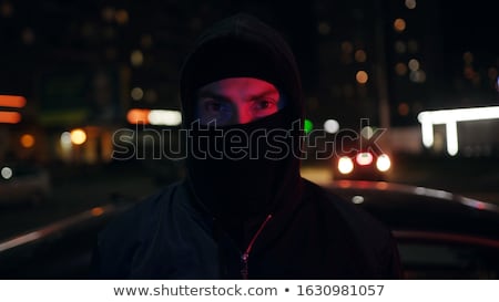 Сток-фото: Portrait Of A Thug In Mask At Night