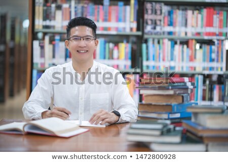 Foto stock: Studantes · bibliotecários
