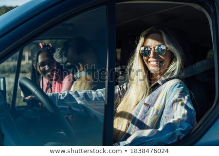 Stock photo: Portrait Of Smiling Pretty Young Blonde With Two Dogs