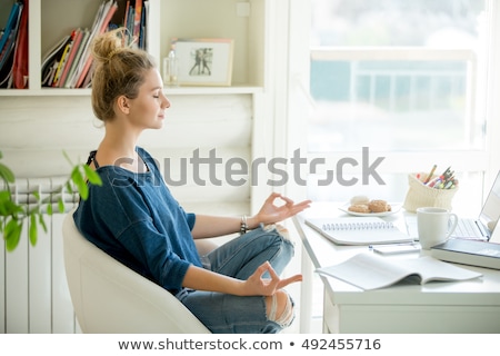 Stock photo: Young Attractive Woman Meditates