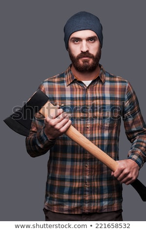 Foto d'archivio: Confident Lumberjack With Axe