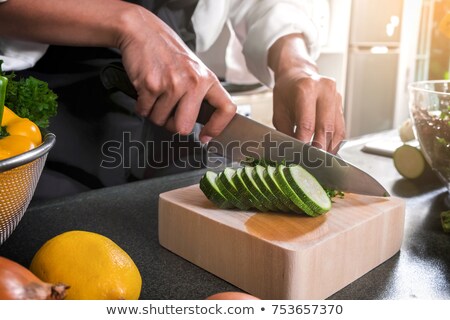 Zdjęcia stock: Close Up On Hands Cutting Fresh Onion