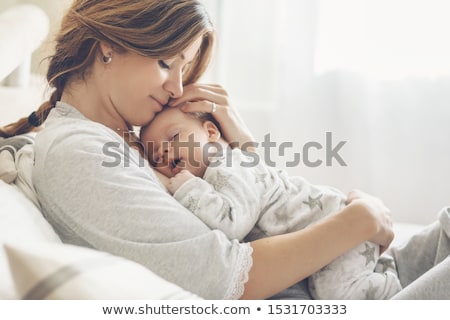 Stok fotoğraf: Mother And Baby Hands