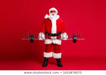 Stock fotó: Shocked Man With A Barbell In The Gym