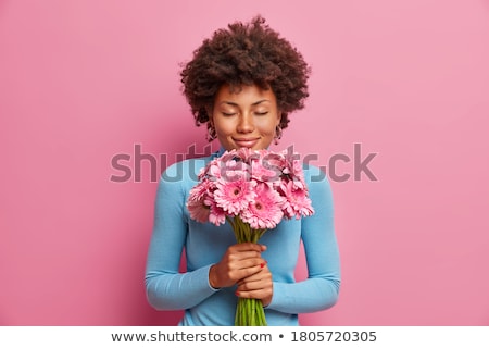 Foto stock: Romantic Woman Hold Pink Gerbera Daisy