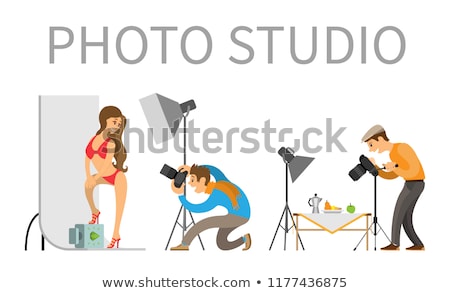 Stock photo: Photographer And Model In Swimsuit In Photo Studio