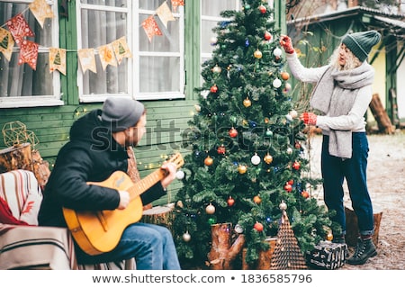 Stok fotoğraf: Woman Outdoors With Guitar